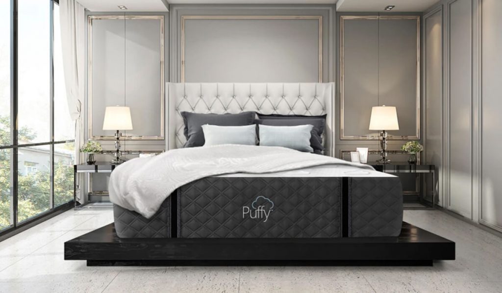 Puffy mattress on a bed